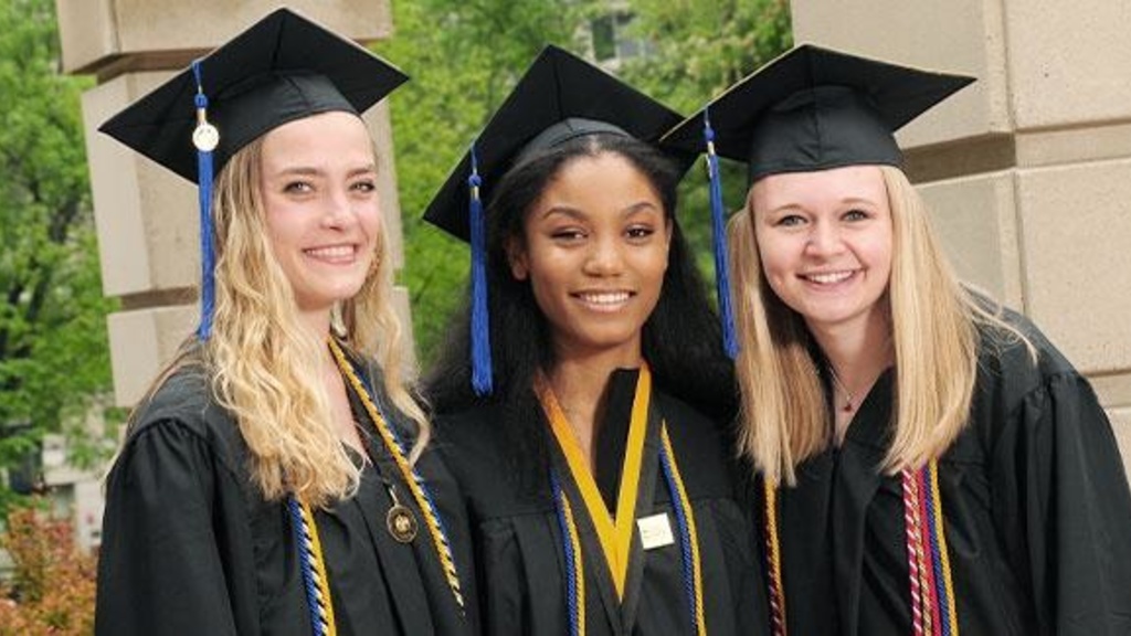 Three Tippie students at commencement