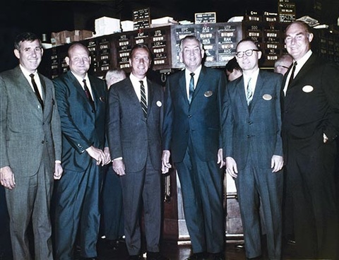 Caption: Rollins, Inc (ROL) begins trading on the NYSE (pictures L to R: Randall Rollins; John Rollins; Robert Haack, president of NYSE; Wayne Rollins; Henry Tippie; Earl Geiger).