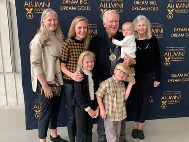 Chuck Swanson with his family at the distinguished alumni awards ceremony.