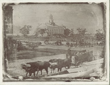 Pentacrest in 1853 with oxen on the surrounding dirt roads
