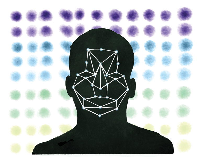 A silhouette of a person with facial recognition dots and lines on thier face.  
