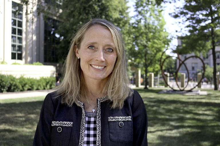 Michelle Hanlon in the Pappajohn Business Building courtyard.