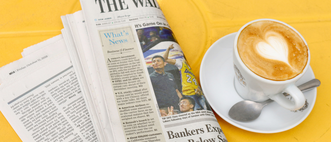 Wall Street Journal and cup of coffee