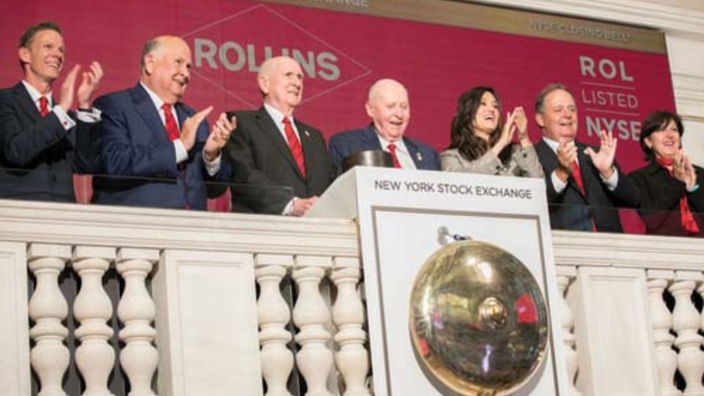 Henry Tippie rings the bell at the NYSE
