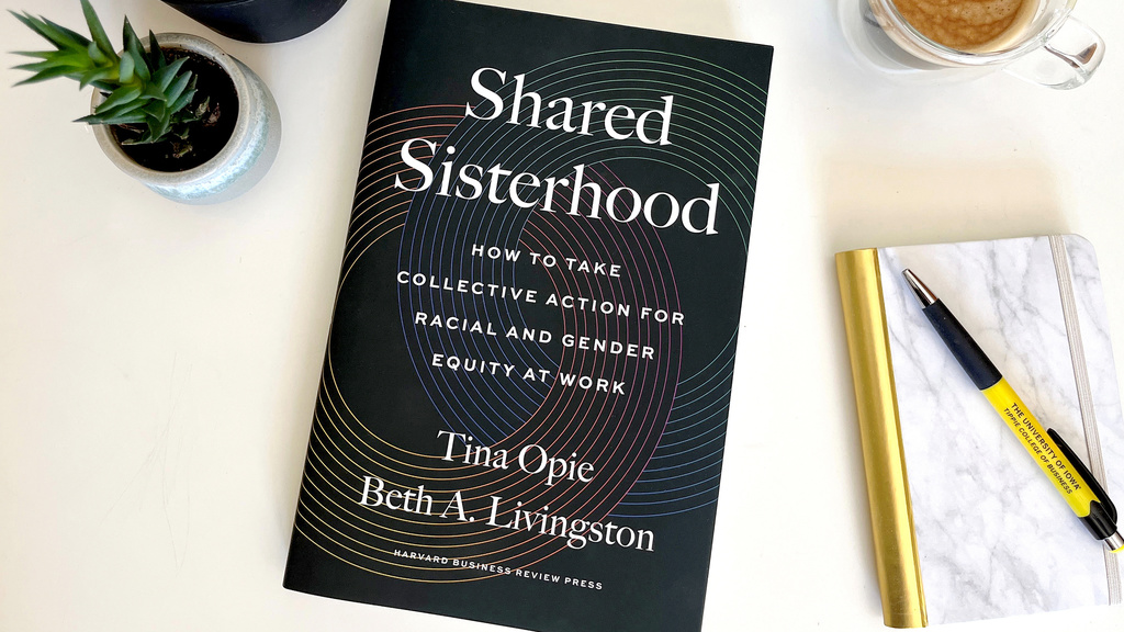 Shared Sisterhood cover with plant coffee pen and notebook